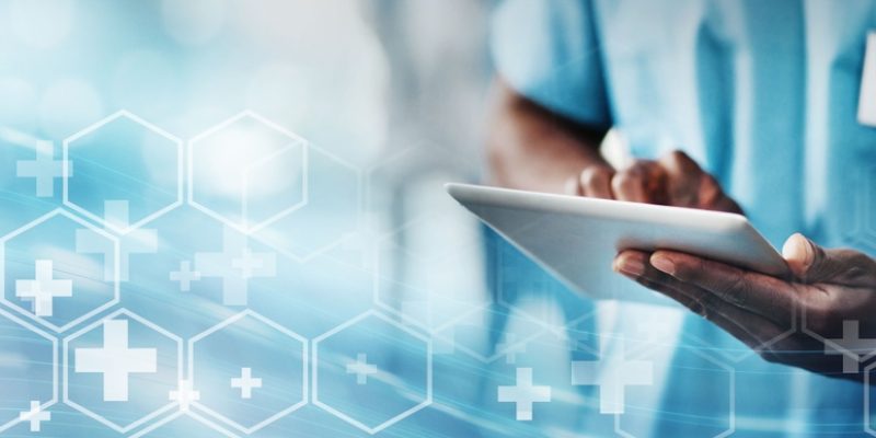 Doctor,With,Tablet,,Medical,And,Technology,Transformation,Overlay,,Digital,Healthcare